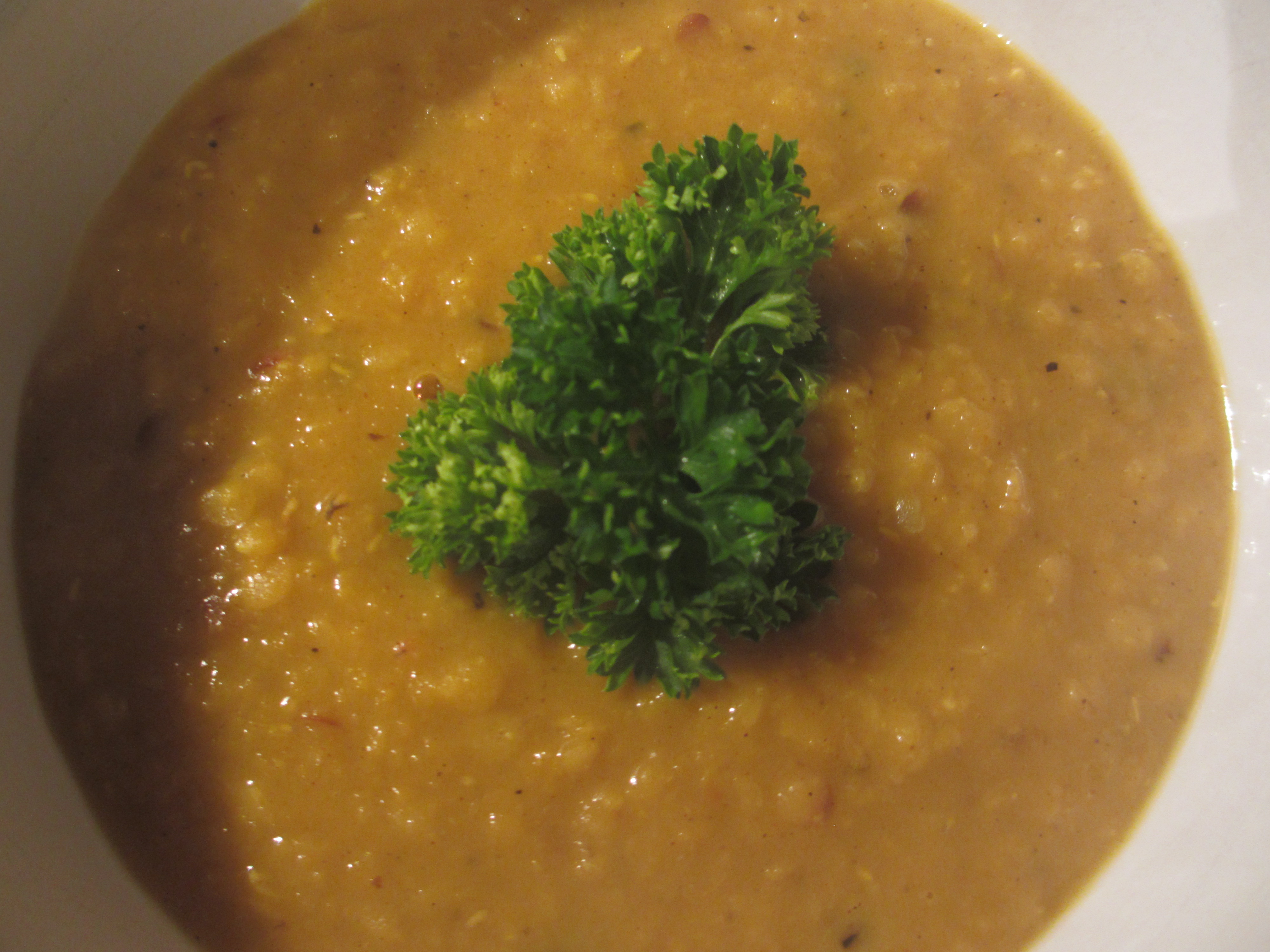 Lentil soup topped with parsley