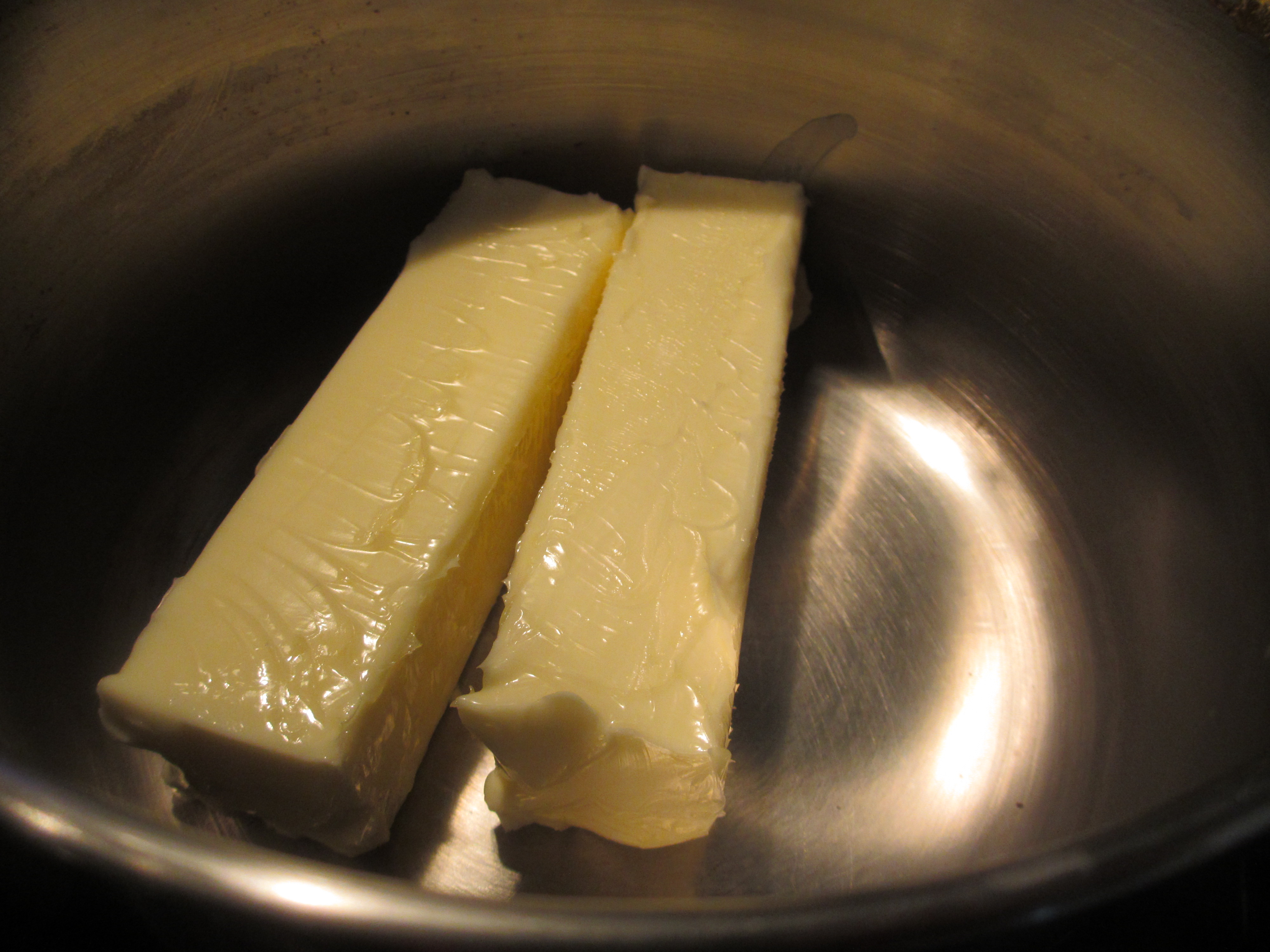 Two sticks of butter in a pot