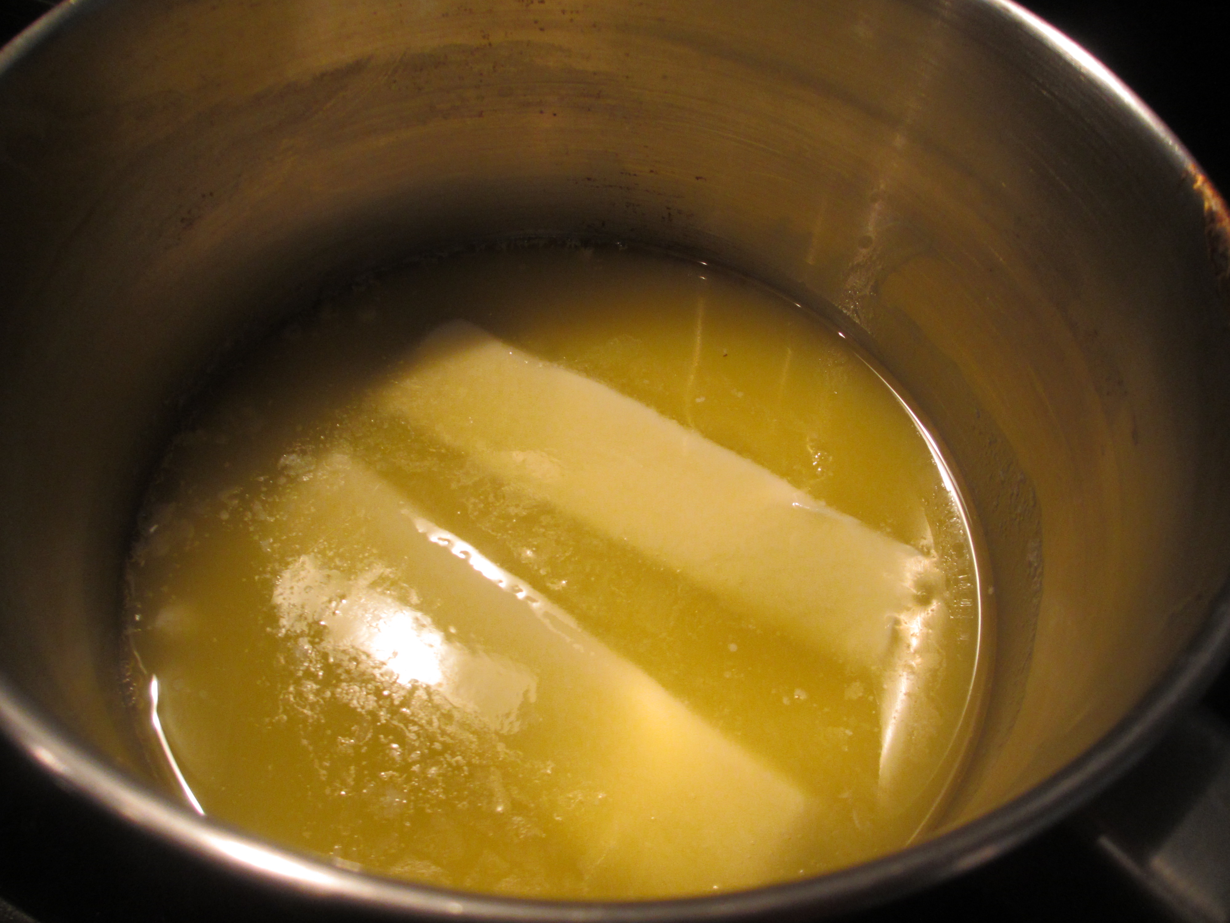 Two sticks of butter melting