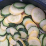 Sliced zucchini, layered on top of beef