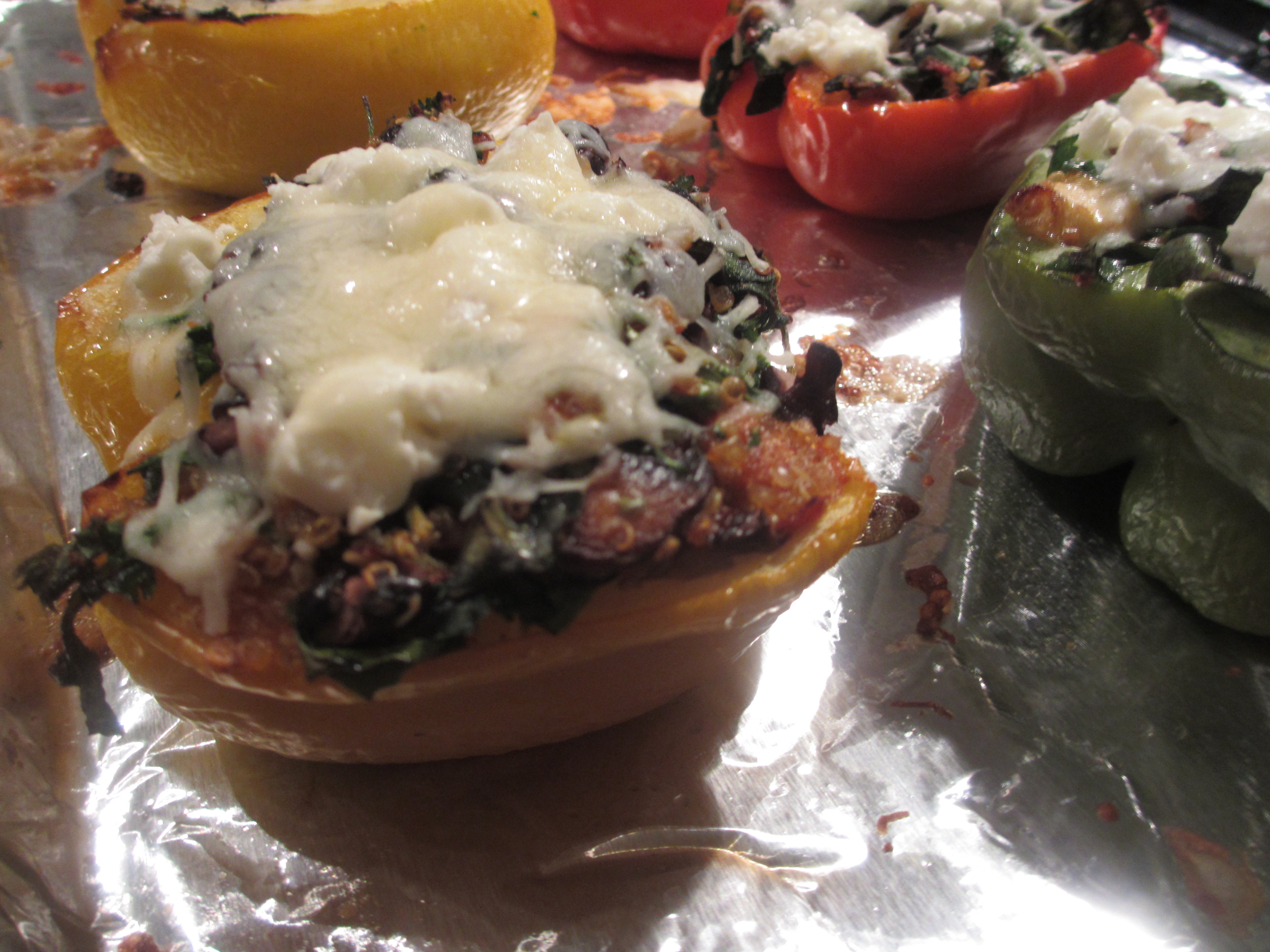 Stuffed bell peppers with melted cheese