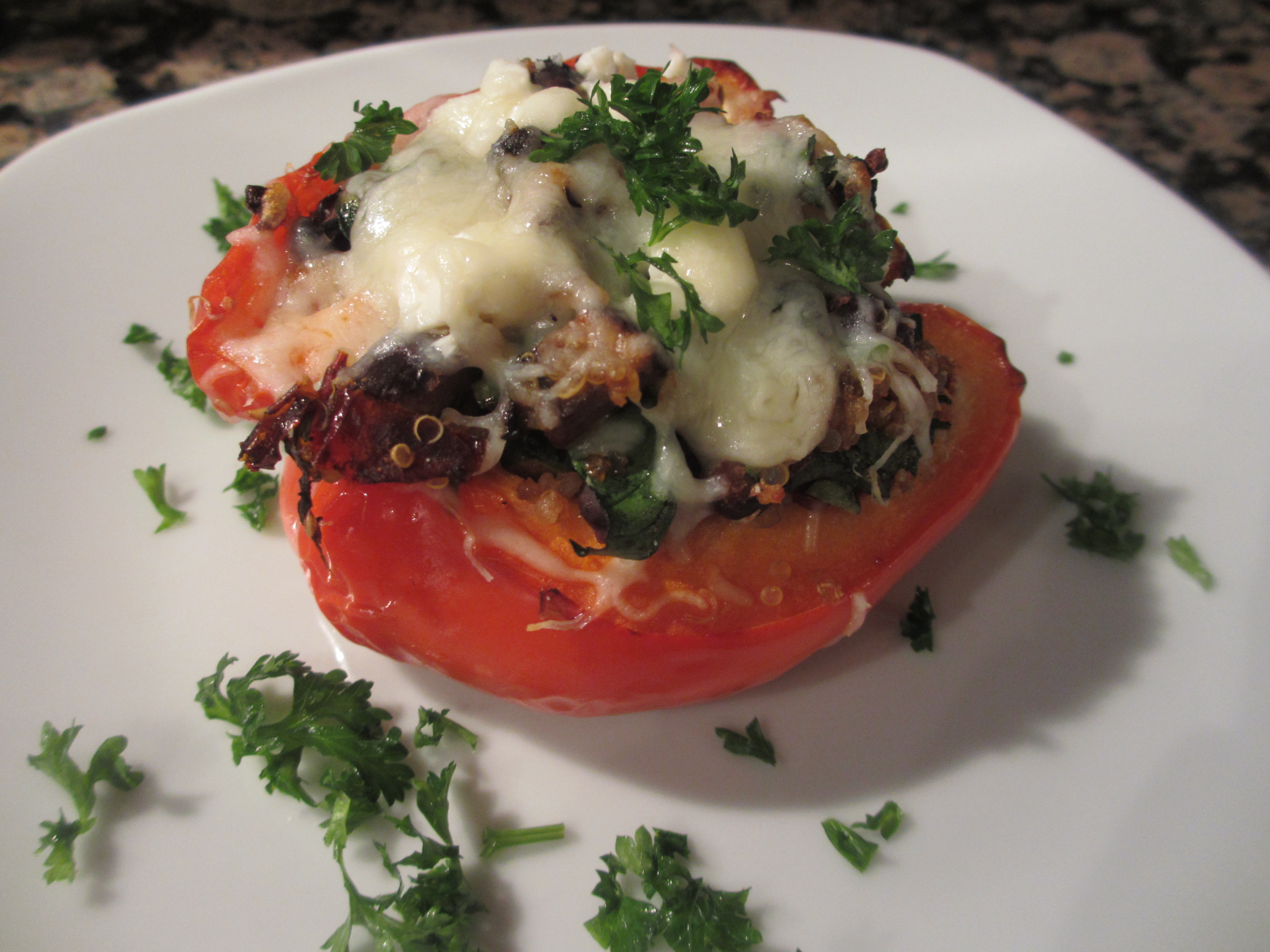 Stuffed bell pepper with melted cheese