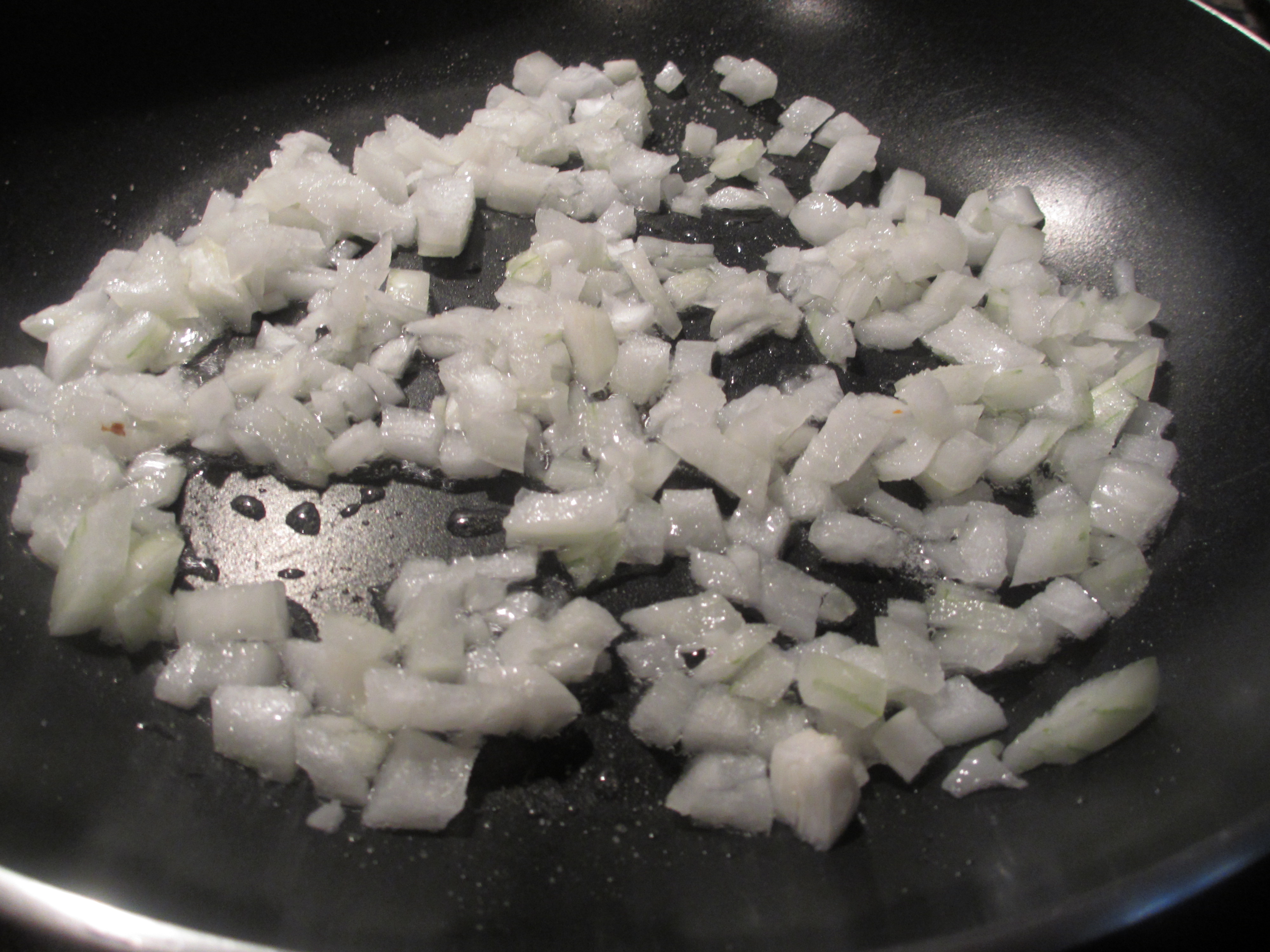 Chopped onions cooking on the stove