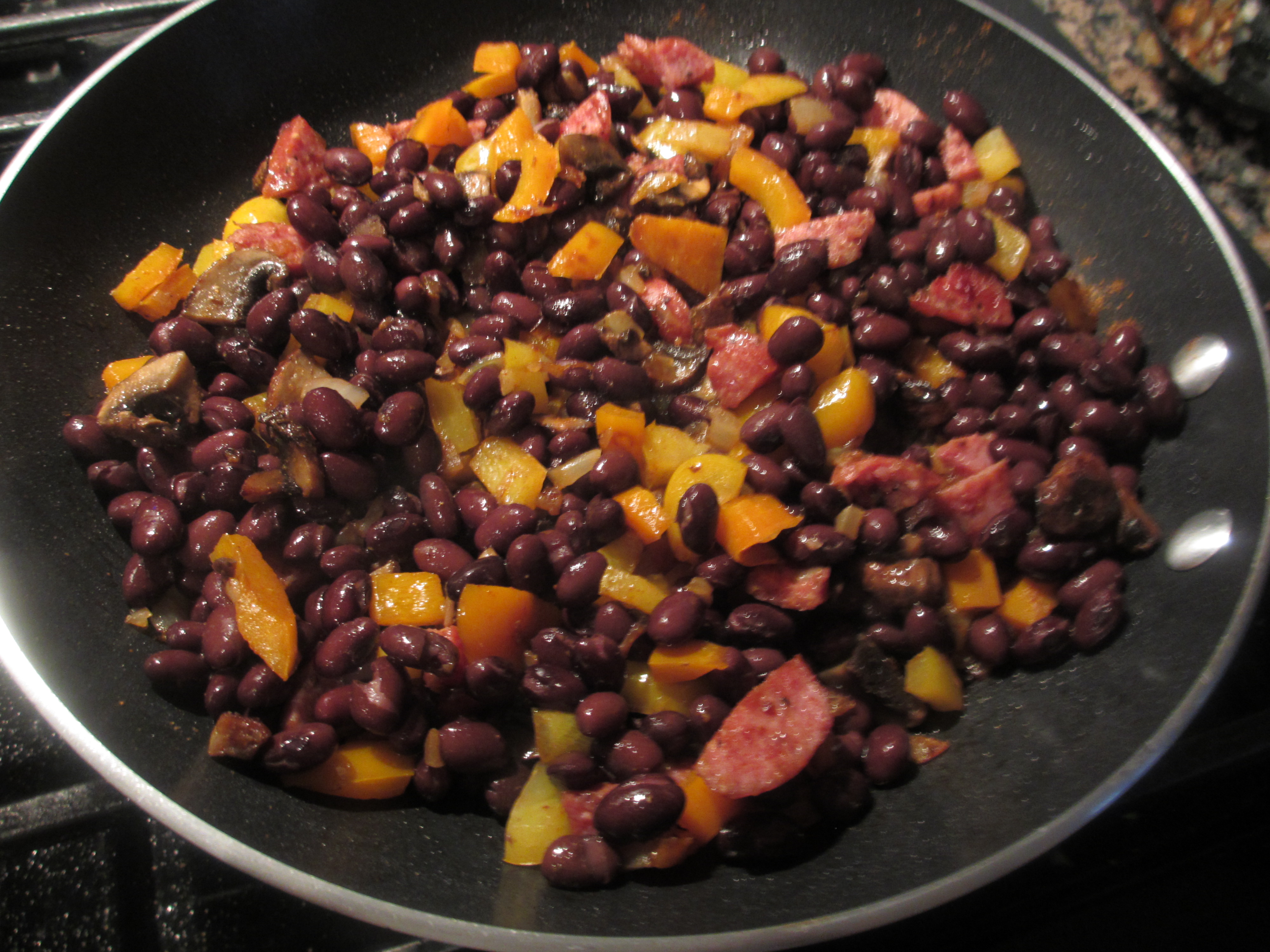Chopped color peppers with sausage and black beans