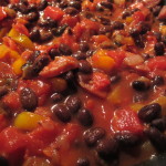 Chopped color peppers with sausage, black beans, and diced tomatoes