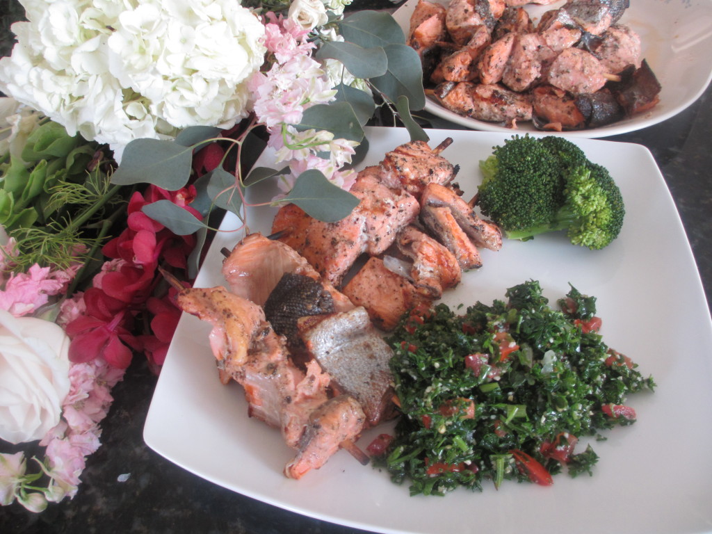 Salmon kabobs, tabouli, and broccoli