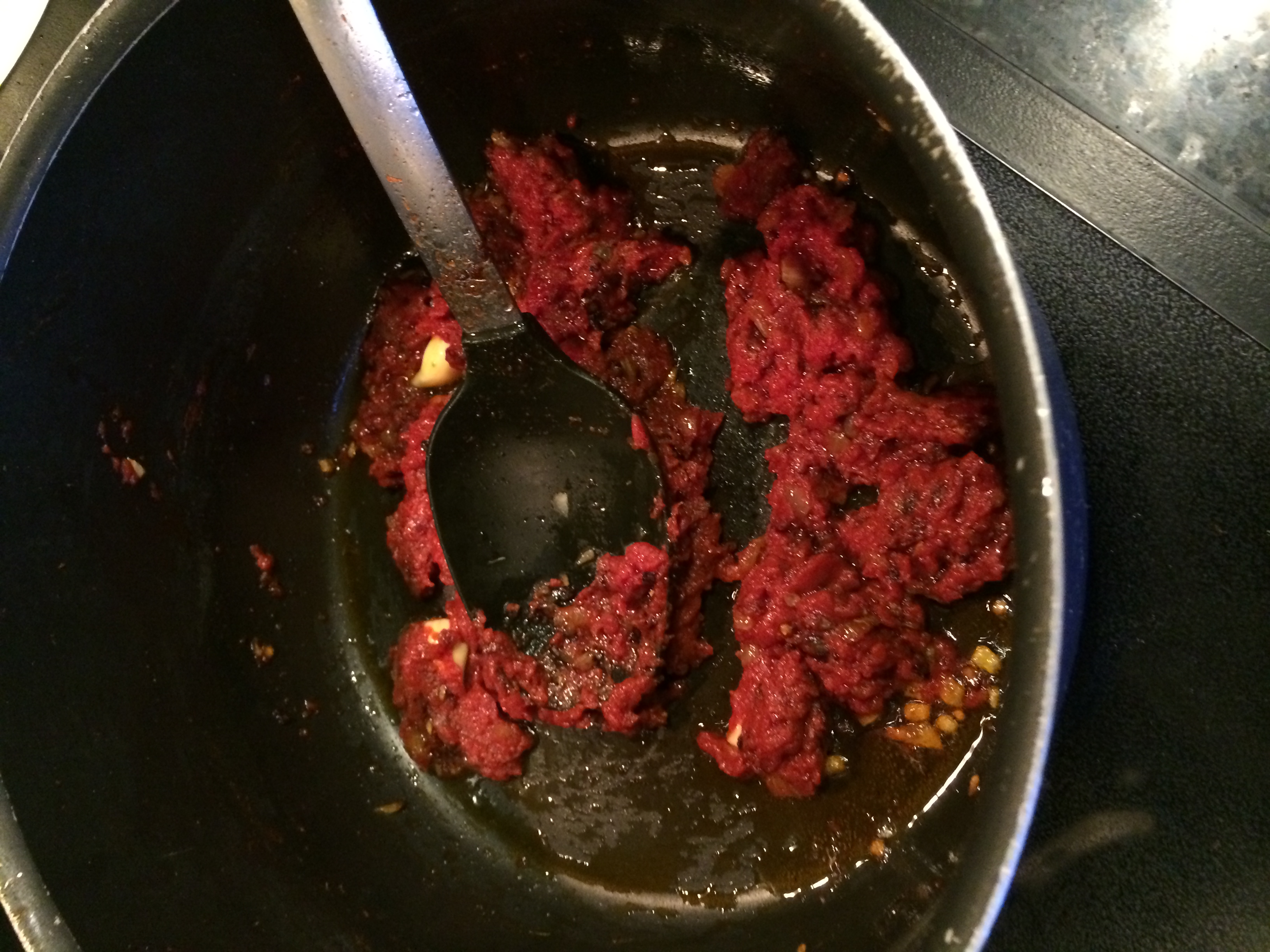 Tomato paste being seared