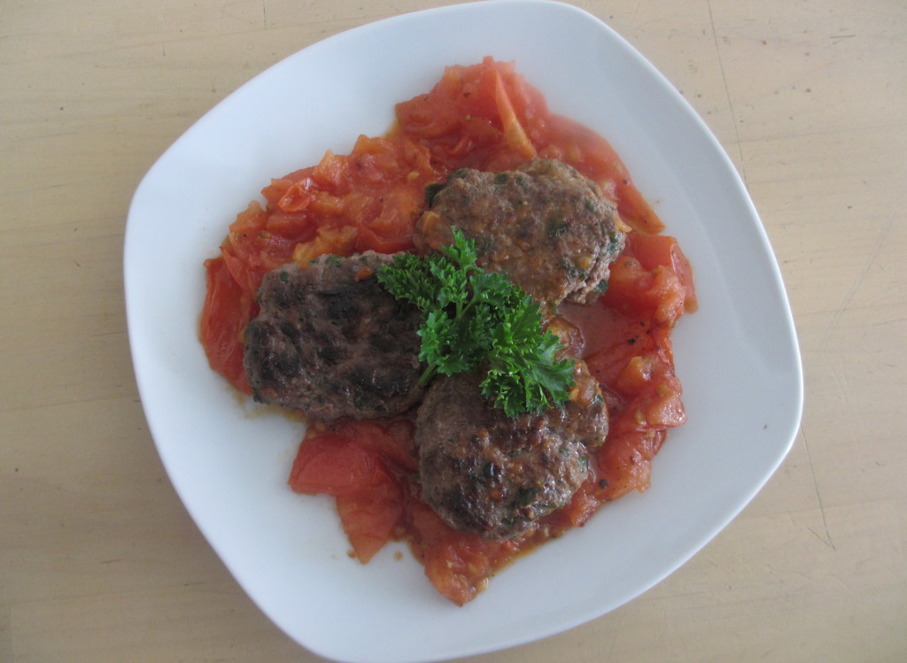 Kafta with fried tomato