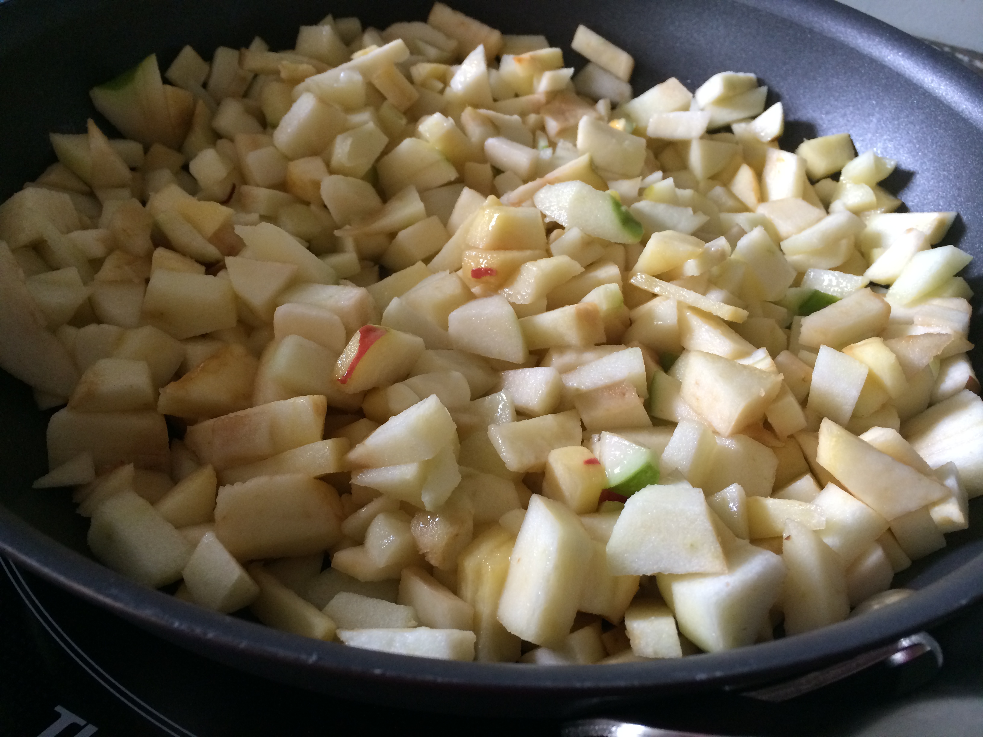 chopped apples in a frying pan