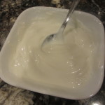 Mixing heated milk with the store bought yogurt