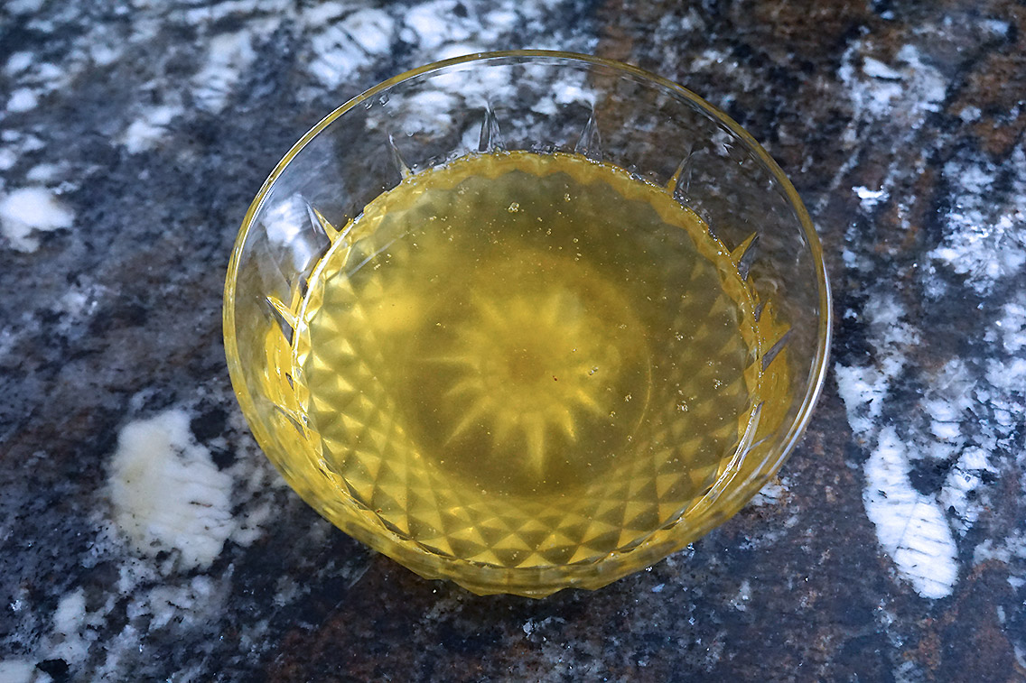 Clarified butter in a small clear bowl