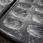 Close up of Butter and lined madeleine pans