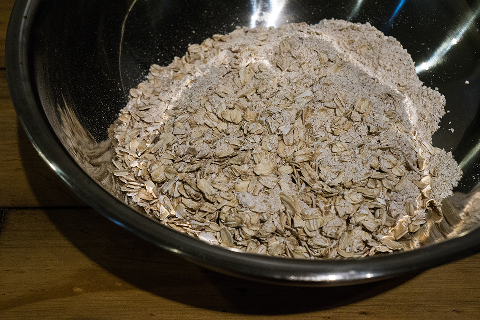 Oat flour and oats in a bowl
